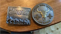 2 commemorative belt buckles