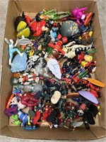 Assortment of action figures and other toys