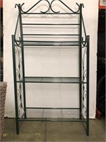 Green metal shelving rack