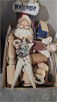 Box of wooden craft decor and supplies,