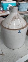 2 gal crockware  jug marked with blue 2