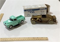2 antique toy cars