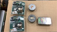 2 Cabelas Fish Eagle reels, box of flies, misc.