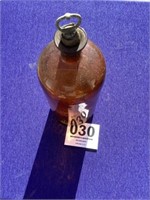 Brown stopper top bottle