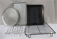 Pizza pan, turkey lifter, broiler pan and metal