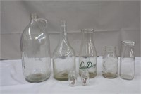 Assortment of bottles including Heinz, Leduc Dairy