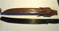 Machete knife with nicely carved sheath