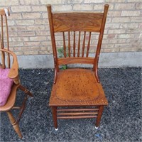 Antique oak dining chair. Star pattern on seat.