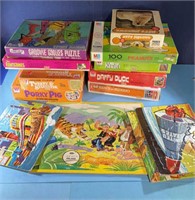 box of kids puzzles see desc