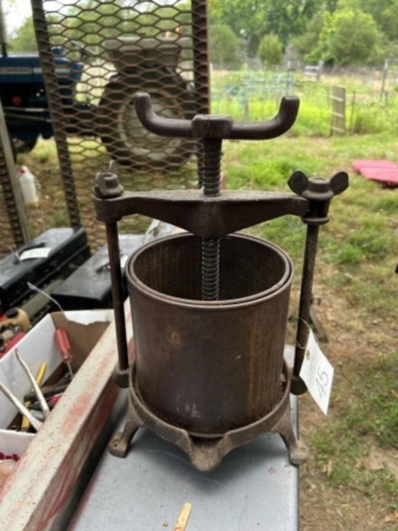 Logan & Strorbridge cast iron fruit press