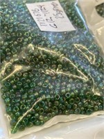 Toho 10/0 glass round seed bead. Green. Two boxes