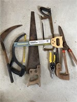 Assorted saws, tin snips