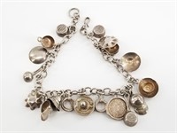 Sterling silver charm bracelet, with cooking and d