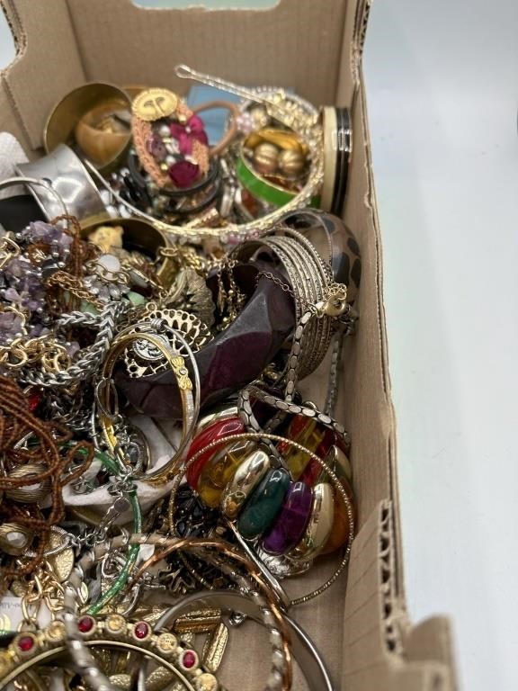 Flat of unsorted Jewelry