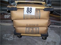 (3) Bags of Sand & (2) Mover Dolly's