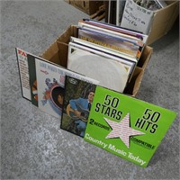 Assorted Vinyl Records in Sleeves