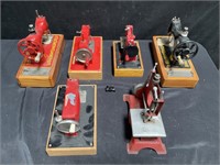 Group of vintage toy sewing machines