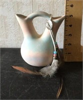 Southwest pottery wedding vase with feathers