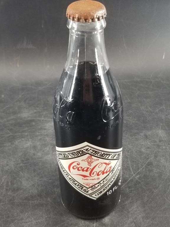 Vintage Coca Cola bottle commemorative seal on bac