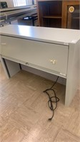 Overhead lighted filing cabinet 
48 inches x 15