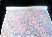 Roll of Pink and Purple floral pattern fabric