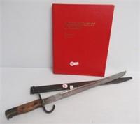 Military bayonet with sheath measuring 21" long