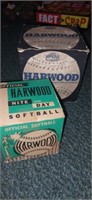 2 hardwood softballs in box