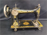 Vintage black and gold Singer sewing machine