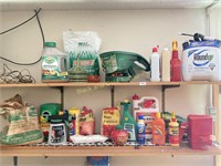 Two shelves of assorted garden chemicals