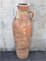 Tall terracotta vase-like pot with open bottom