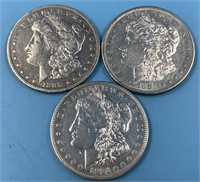 3 Morgan silver dollars: 1881 S, 1888 O, 1921 D