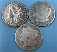 3 Morgan silver dollars: 1889 O, 1901 O, 1896