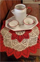 Red/white doilie, enamelware coffee service set