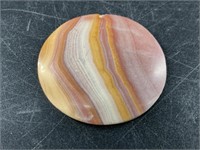 Onyx stone disk about 1.5" diameter