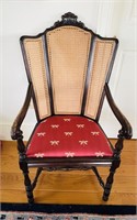 Antique armchair with newer dragonfly