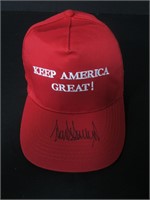 DONALD TRUMP SIGNED RED KAG HAT AUD COA