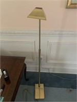 Heavy brass reading lamp with some dings in base
