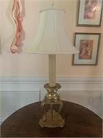 Ornate gold metal lamp with faux marble