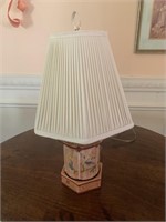 Small lamp with orange/brown background with