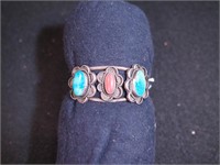 Unmarked silver cuff bracelet with turquoise and
