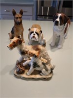 4 piece dog Statue lot Godfrey North Light. Living