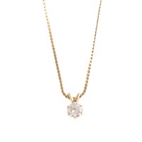 A Lady's Diamond Solitaire Pendant in Gold