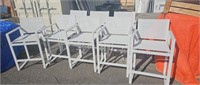 Eight white patio bar stools