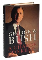 AUTOGRAPHED BOOK: "A CHARGE TO KEEP" GEORGE W BUSH