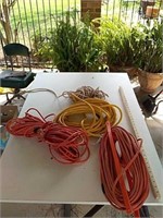 Estate lot of heavy duty extension cords and rope