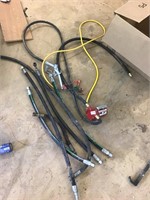 Gas pump, nozzle, and hydraulic hoses