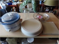 Crock pot, Tupperware relish tray, candle bowl.