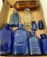 TRAY OF COBALT VINTAGE BOTTLES,