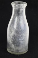 EMBOSSED WHITBY DAIRY BOTTLE