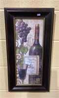 Wine themed artwork with glass measuring 24 1/2“